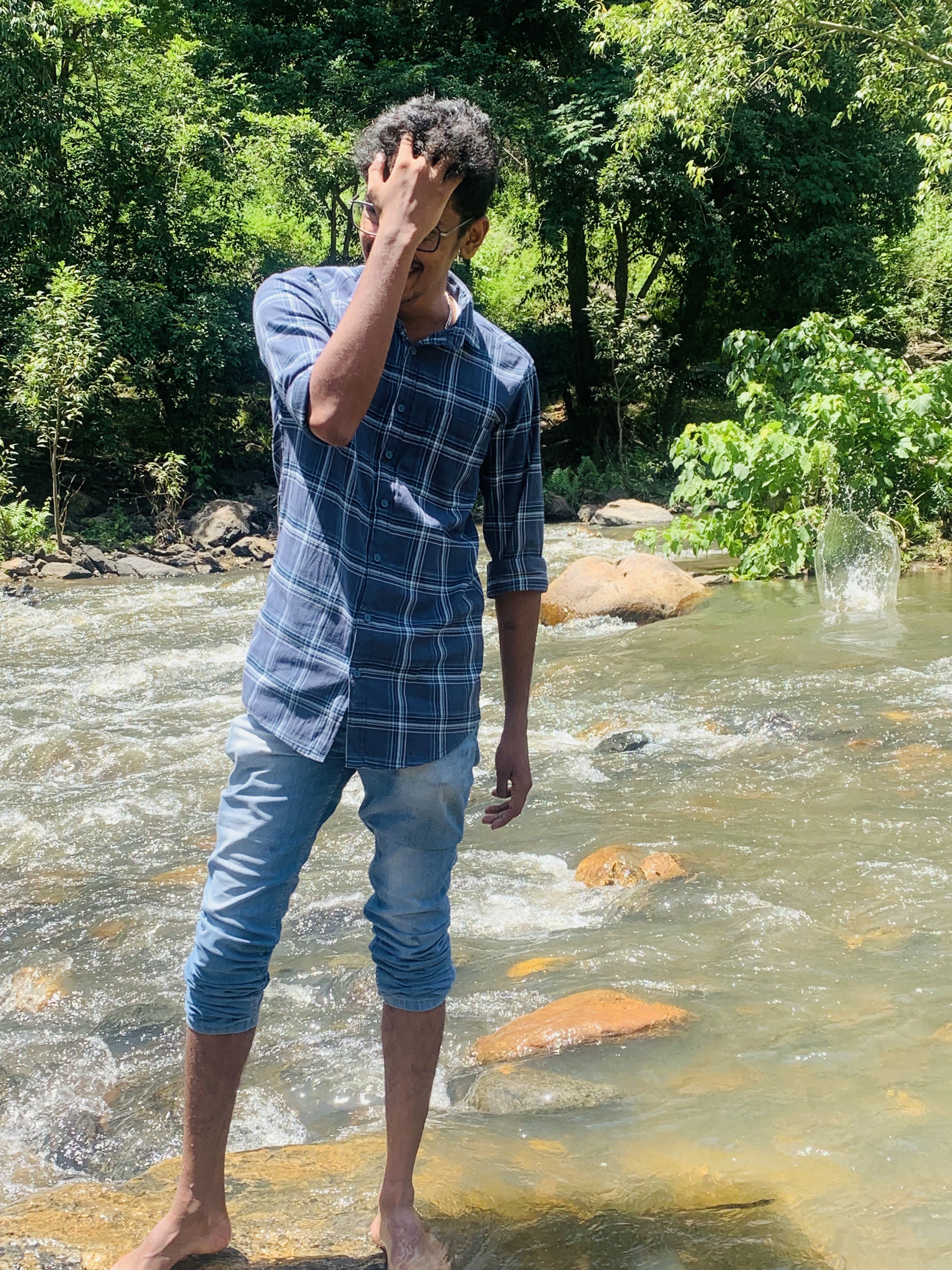 Naveen U
