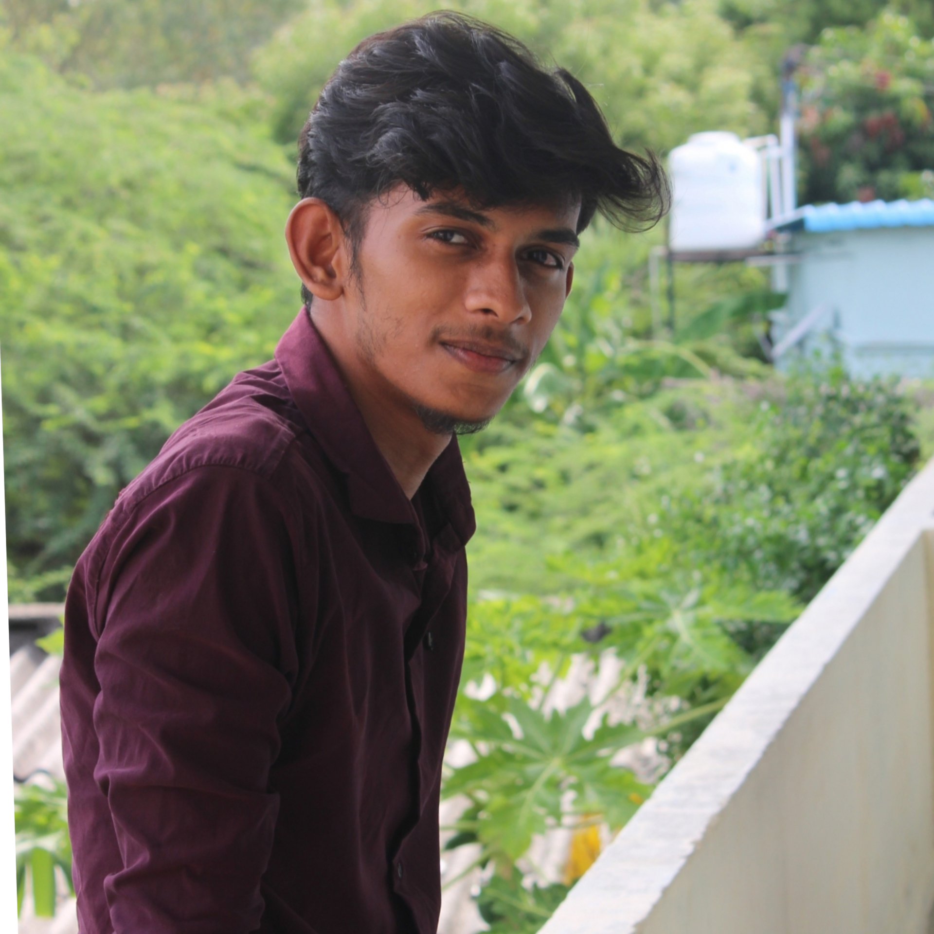 Tharun G