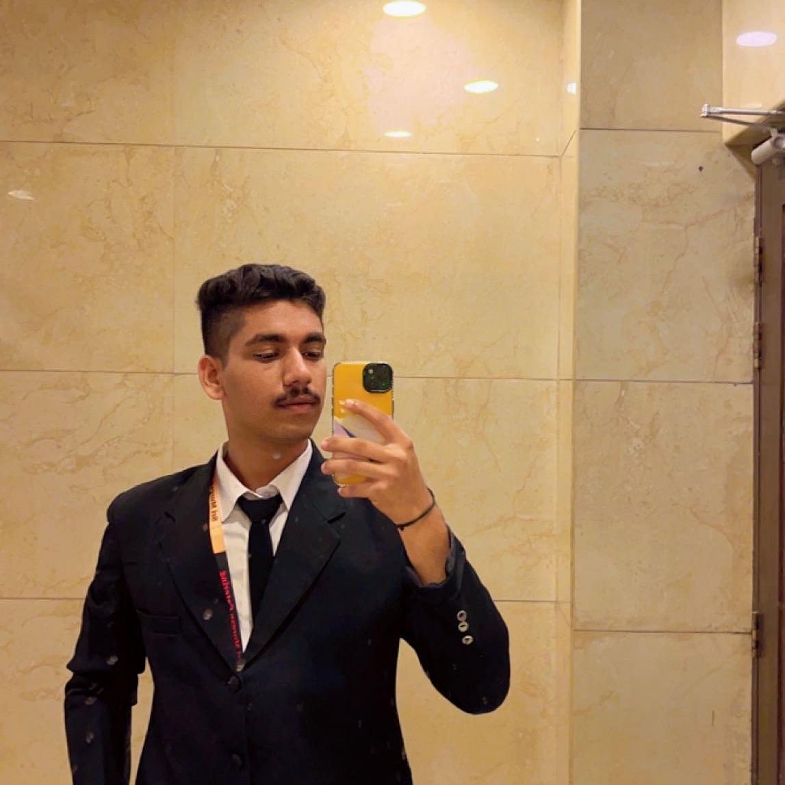 NIKHIL BOMNALE