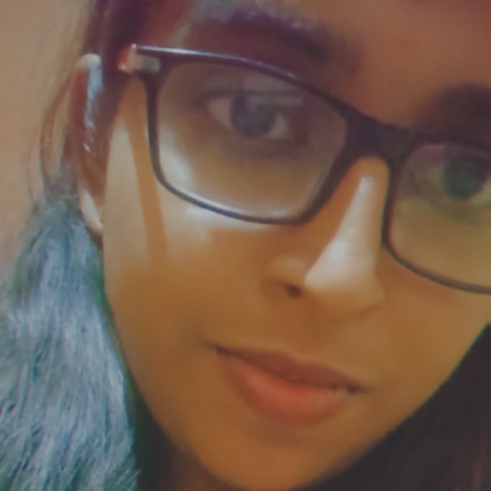 Monisha T