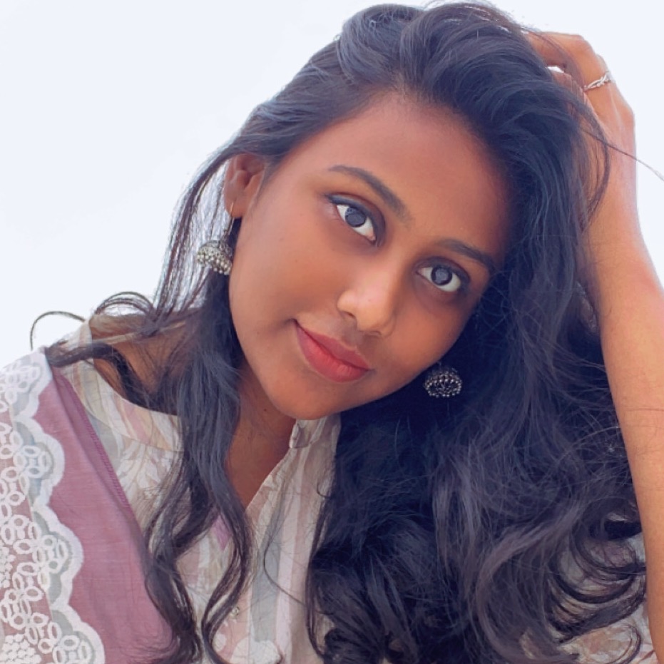 Nisha M H
