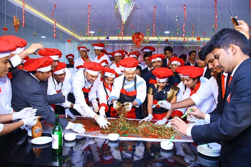 Vainavi Educational Institutions Hyderabad Cake Mixing photo 2