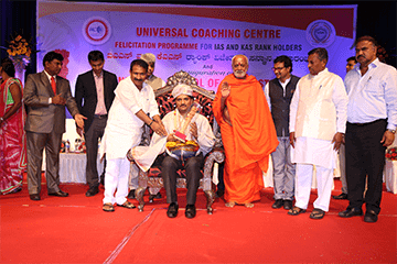 Universal Group of Institutions Bangalore Felicitation For IAS & KAS Rank Holders photo 9