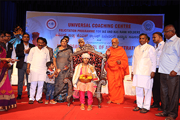 Universal Group of Institutions Bangalore Felicitation For IAS & KAS Rank Holders photo 11