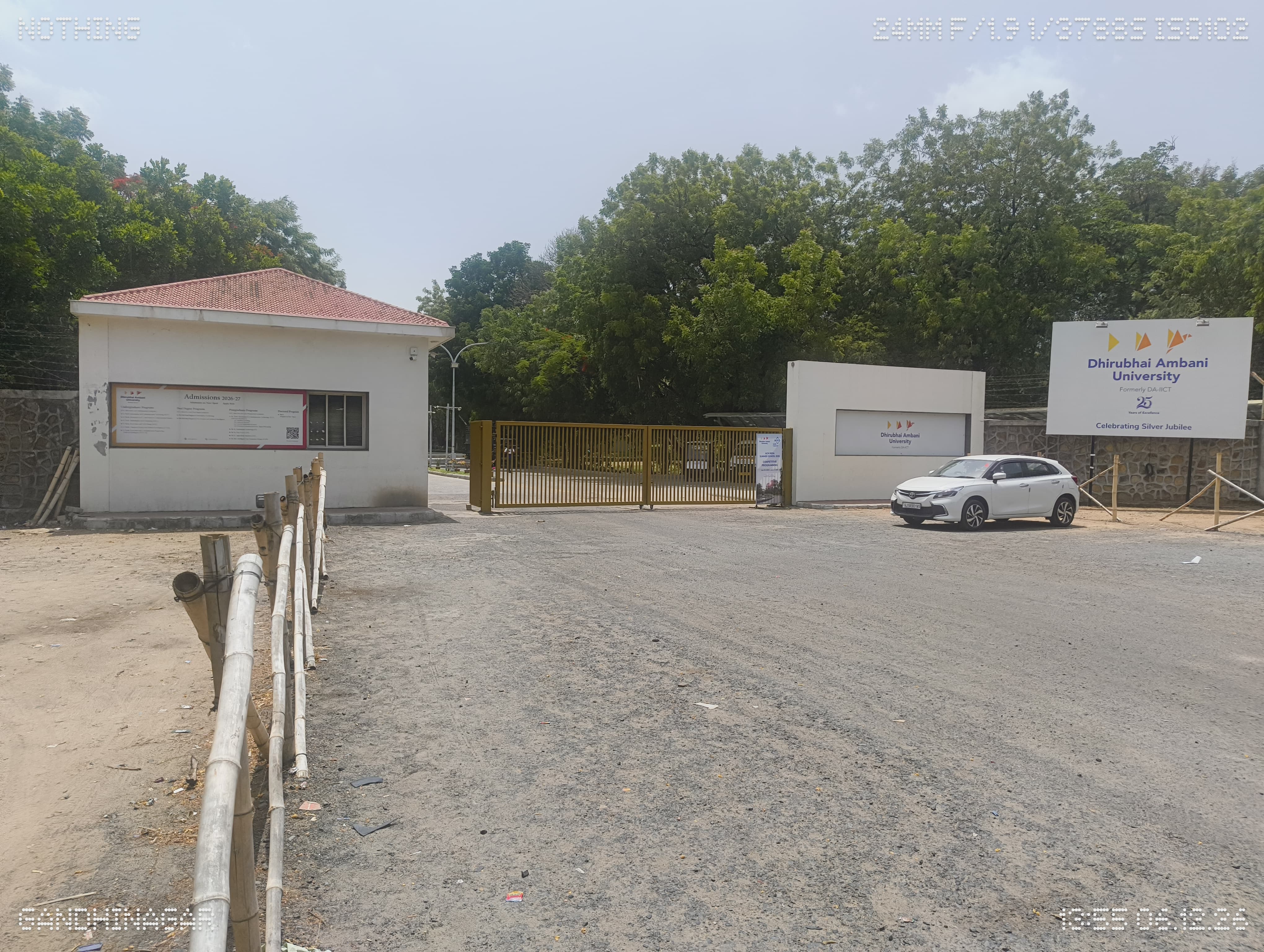 Dhirubhai Ambani University (formerly DAIICT) Main Entrance View media (3) by 1781262589_frontgate_outside.jpg