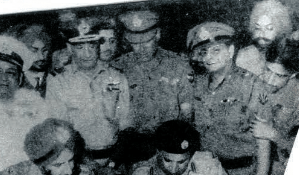 December 1971: Pakistani and Indian
officers at the surrender at Dhaka, where the Pakistani army of about 90,000
laid down arms, the moment that created the free nation of Bangladesh. NCERT
<em>Politics in India since Independence