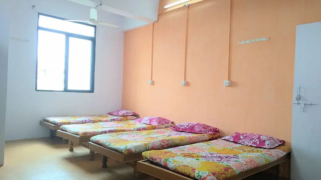 Silver Oak University Hostel Room